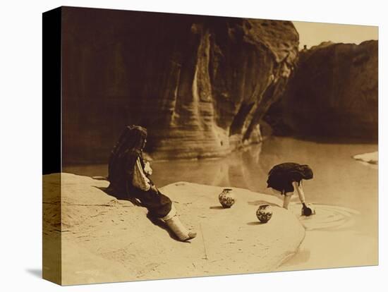 At the Old Well at Acoma-Edward S. Curtis-Stretched Canvas