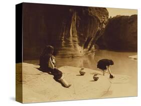 At the Old Well at Acoma-Edward S. Curtis-Stretched Canvas