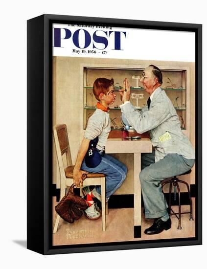"At the Optometrist" or "Eye Doctor" Saturday Evening Post Cover, May 19,1956-Norman Rockwell-Framed Stretched Canvas