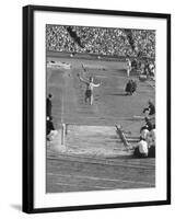 Athlete Competing in Long Jump-null-Framed Premium Photographic Print