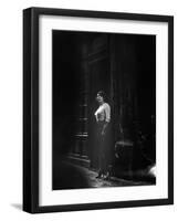 Atmospheric of Parisienne Prostitute Standing Near Doorway on Street-Alfred Eisenstaedt-Framed Photographic Print