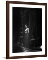 Atmospheric of Parisienne Prostitute Standing Near Doorway on Street-Alfred Eisenstaedt-Framed Photographic Print