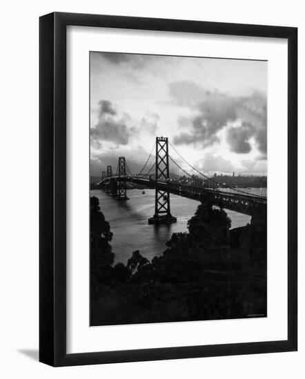 Atmospheric View of the San Francisco Oakland Bay Bridge Viewed from the Oakland Side at Dusk-null-Framed Photographic Print