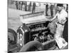 Attilio Marinoni, Chief Mechanic of Scuderia Ferrari, with an Alfa Romeo, 1934-null-Mounted Photographic Print