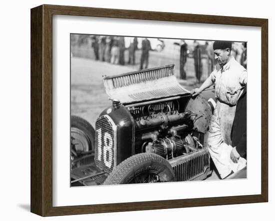 Attilio Marinoni, Chief Mechanic of Scuderia Ferrari, with an Alfa Romeo, 1934-null-Framed Photographic Print