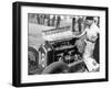 Attilio Marinoni, Chief Mechanic of Scuderia Ferrari, with an Alfa Romeo, 1934-null-Framed Photographic Print