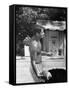 Attorney General Robert F. Kennedy Holding Football, with Dog Nearby, at His Swimming Pool-null-Framed Stretched Canvas