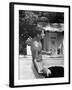 Attorney General Robert F. Kennedy Holding Football, with Dog Nearby, at His Swimming Pool-null-Framed Photographic Print