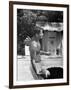 Attorney General Robert F. Kennedy Holding Football, with Dog Nearby, at His Swimming Pool-null-Framed Photographic Print