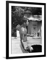 Attorney General Robert F. Kennedy Holding Football, with Dog Nearby, at His Swimming Pool-null-Framed Photographic Print