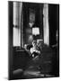 Attorney General Robert F. Kennedy Sitting in Chair in His Office-null-Mounted Premium Photographic Print