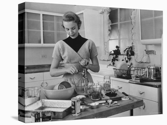 Attractive Housewife in Modern Kitchen, Preparing Food-Eliot Elisofon-Stretched Canvas