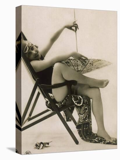 Attractive Woman Posing in Her Swimsuit in a Deckchair, with a Parasol-null-Stretched Canvas