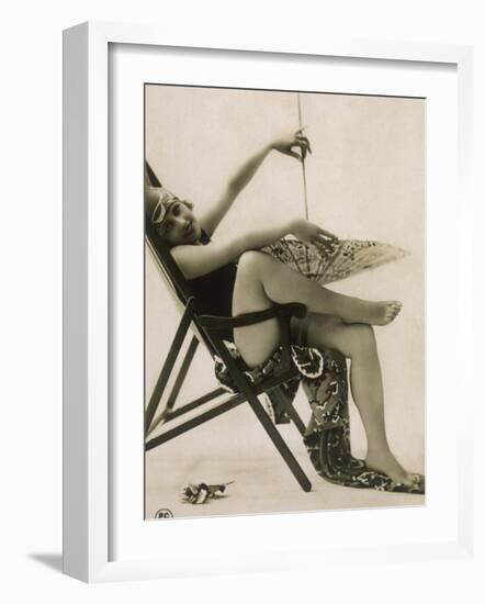 Attractive Woman Posing in Her Swimsuit in a Deckchair, with a Parasol-null-Framed Photographic Print