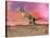 Aucasaurus Dinosaur Roaring in the Desert by Sunset-null-Stretched Canvas