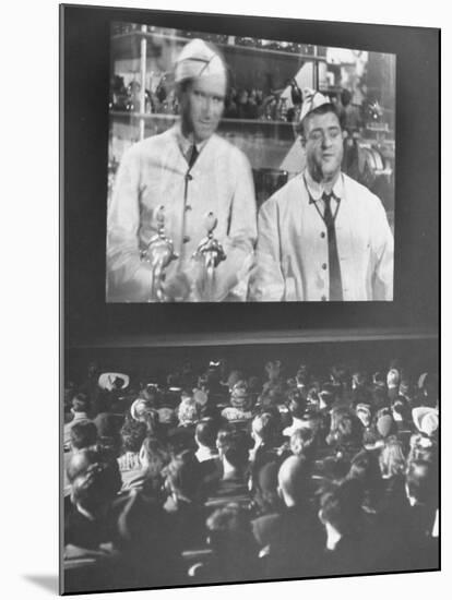 Audience at Omaha Theater Watching Abbott and Costello in Feature Picture "Who Done It"-Alfred Eisenstaedt-Mounted Premium Photographic Print