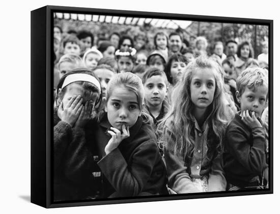Audience of Children Sitting Very Still, with Rapt Expressions, Watching Puppet Show at Tuileries-Alfred Eisenstaedt-Framed Stretched Canvas