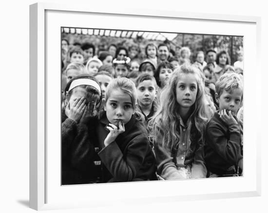 Audience of Children Sitting Very Still, with Rapt Expressions, Watching Puppet Show at Tuileries-Alfred Eisenstaedt-Framed Photographic Print