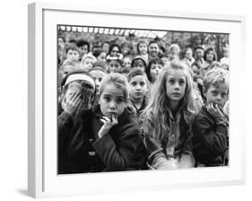 Audience of Children Sitting Very Still, with Rapt Expressions, Watching Puppet Show at Tuileries-Alfred Eisenstaedt-Framed Photographic Print