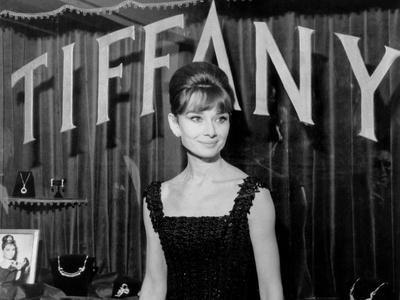 https://imgc.allpostersimages.com/img/posters/audrey-hepburn-at-a-press-event-for-breakfast-at-tiffany-s-1961_u-L-Q1BUBVO0.jpg?artPerspective=n