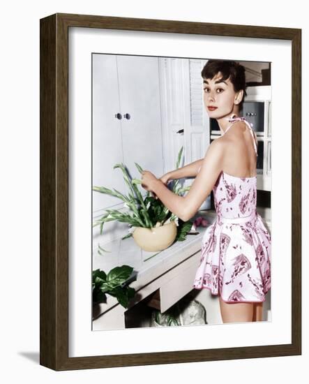 Audrey Hepburn Creates a Flower Arrangement, Ca. Early 1950s-null-Framed Photo