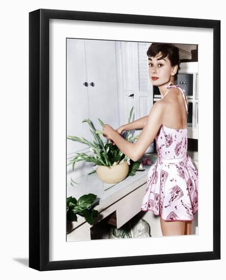 Audrey Hepburn Creates a Flower Arrangement, Ca. Early 1950s-null-Framed Photo