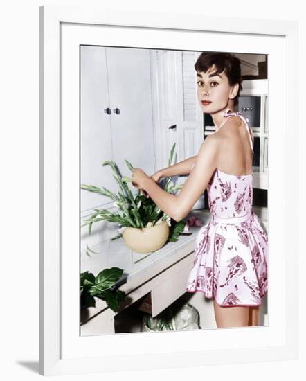 Audrey Hepburn Creates a Flower Arrangement, Ca. Early 1950s-null-Framed Photo