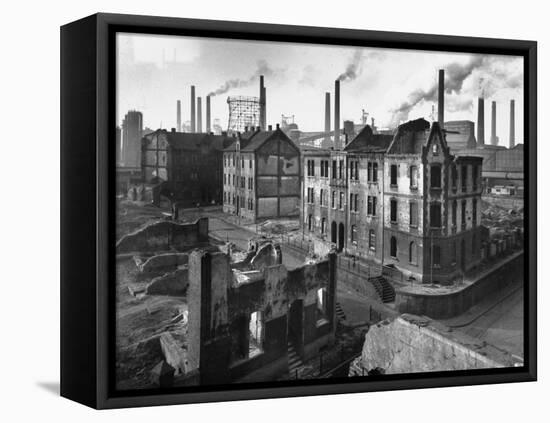 August Thyssen Steel Mill, Large Steel Works, Looming Smokily Behind Bomb-Ruined Town-Ralph Crane-Framed Stretched Canvas