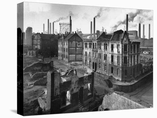 August Thyssen Steel Mill, Large Steel Works, Looming Smokily Behind Bomb-Ruined Town-Ralph Crane-Stretched Canvas