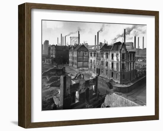 August Thyssen Steel Mill, Large Steel Works, Looming Smokily Behind Bomb-Ruined Town-Ralph Crane-Framed Photographic Print