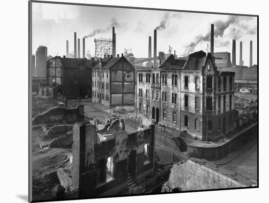 August Thyssen Steel Mill, Large Steel Works, Looming Smokily Behind Bomb-Ruined Town-Ralph Crane-Mounted Photographic Print