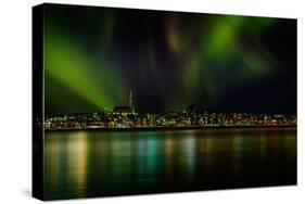 Aurora Borealis or Northern Lights over Reykjavik Skyline, Reykjavik, Iceland-null-Stretched Canvas