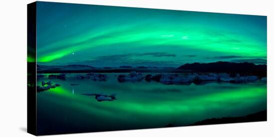 Aurora Borealis or Northern Lights over the Jokulsarlon Lagoon, Iceland-null-Stretched Canvas