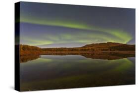 Aurora Borealis over Fish Lake, Yukon, Canada-null-Stretched Canvas