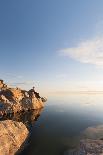 Male Hiker Resting Along The Shore Of The Great Salt Lake From Antelope Island State Park In Utah-Austin Cronnelly-Photographic Print