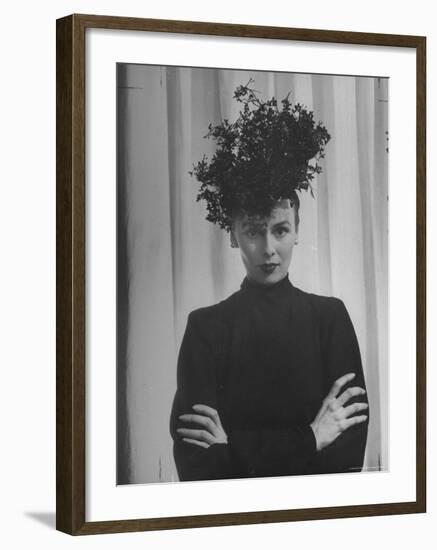 Austine Cassini Standing with Arms Crossed and Wearing Extravagant Hat-Marie Hansen-Framed Premium Photographic Print