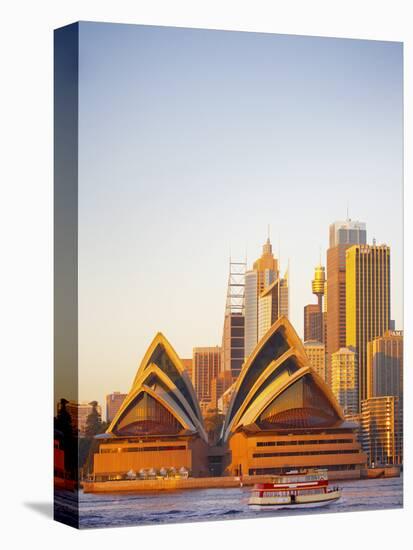 Australia, New South Wales, Sydney, Sydney Opera House, Passenger Ferry Passing Opera House-Shaun Egan-Stretched Canvas