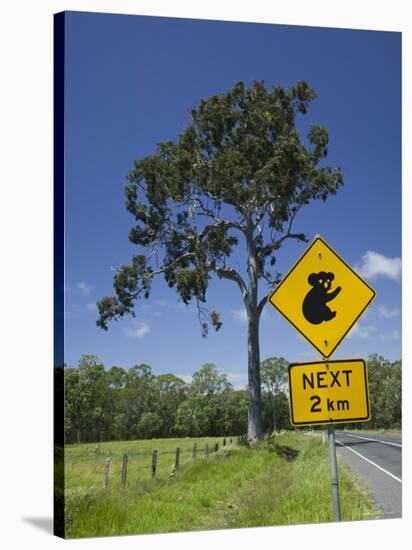 Australia, Queensland, Fraser Coast, Maryborough, Koala Crossing Sign on the Bruce Highway-Walter Bibikow-Stretched Canvas