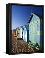 Australia, Victoria, Melbourne; Colourful Beach Huts at Brighton Beach-Andrew Watson-Framed Stretched Canvas