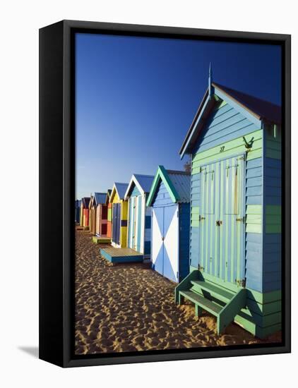 Australia, Victoria, Melbourne; Colourful Beach Huts at Brighton Beach-Andrew Watson-Framed Stretched Canvas