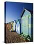 Australia, Victoria, Melbourne; Colourful Beach Huts at Brighton Beach-Andrew Watson-Stretched Canvas