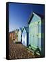 Australia, Victoria, Melbourne; Colourful Beach Huts at Brighton Beach-Andrew Watson-Framed Stretched Canvas