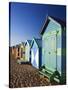 Australia, Victoria, Melbourne; Colourful Beach Huts at Brighton Beach-Andrew Watson-Stretched Canvas