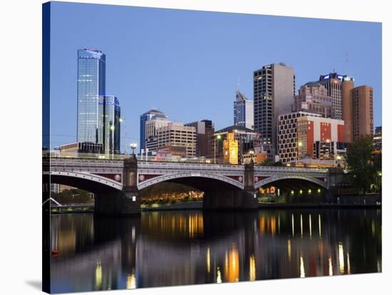 Australia, Victoria, Melbourne; Princes Bridge on the Yarra River, with the City Skyline at Dusk-Andrew Watson-Stretched Canvas