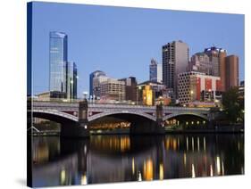 Australia, Victoria, Melbourne; Princes Bridge on the Yarra River, with the City Skyline at Dusk-Andrew Watson-Stretched Canvas