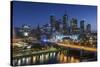 Australia, Victoria, Melbourne, Skyline with River and Bridge at Dusk-Walter Bibikow-Stretched Canvas