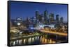 Australia, Victoria, Melbourne, Skyline with River and Bridge at Dusk-Walter Bibikow-Framed Stretched Canvas