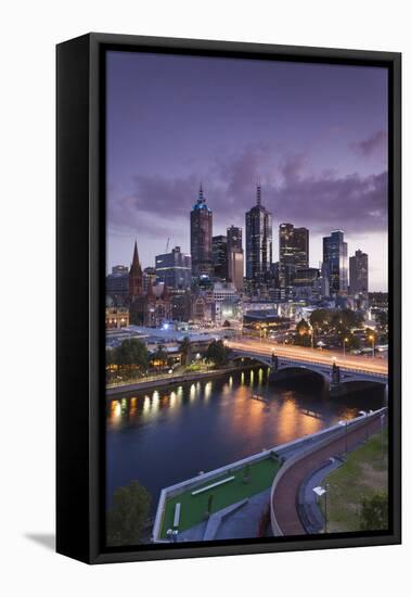 Australia, Victoria, Melbourne, Skyline with River and Bridge at Dusk-Walter Bibikow-Framed Stretched Canvas