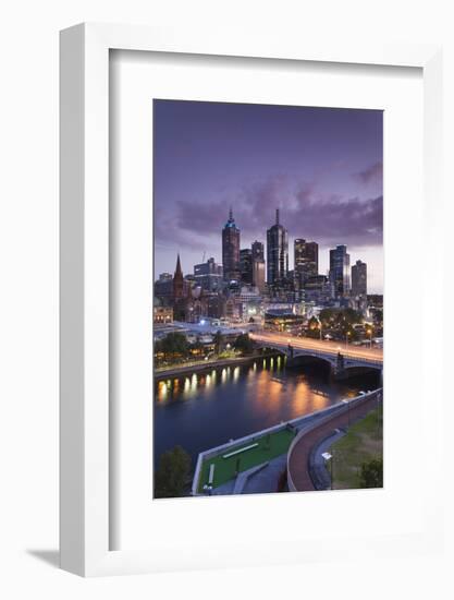 Australia, Victoria, Melbourne, Skyline with River and Bridge at Dusk-Walter Bibikow-Framed Photographic Print