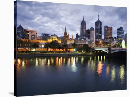 Australia, Victoria, Melbourne; Yarra River and City Skyline by Night-Andrew Watson-Stretched Canvas